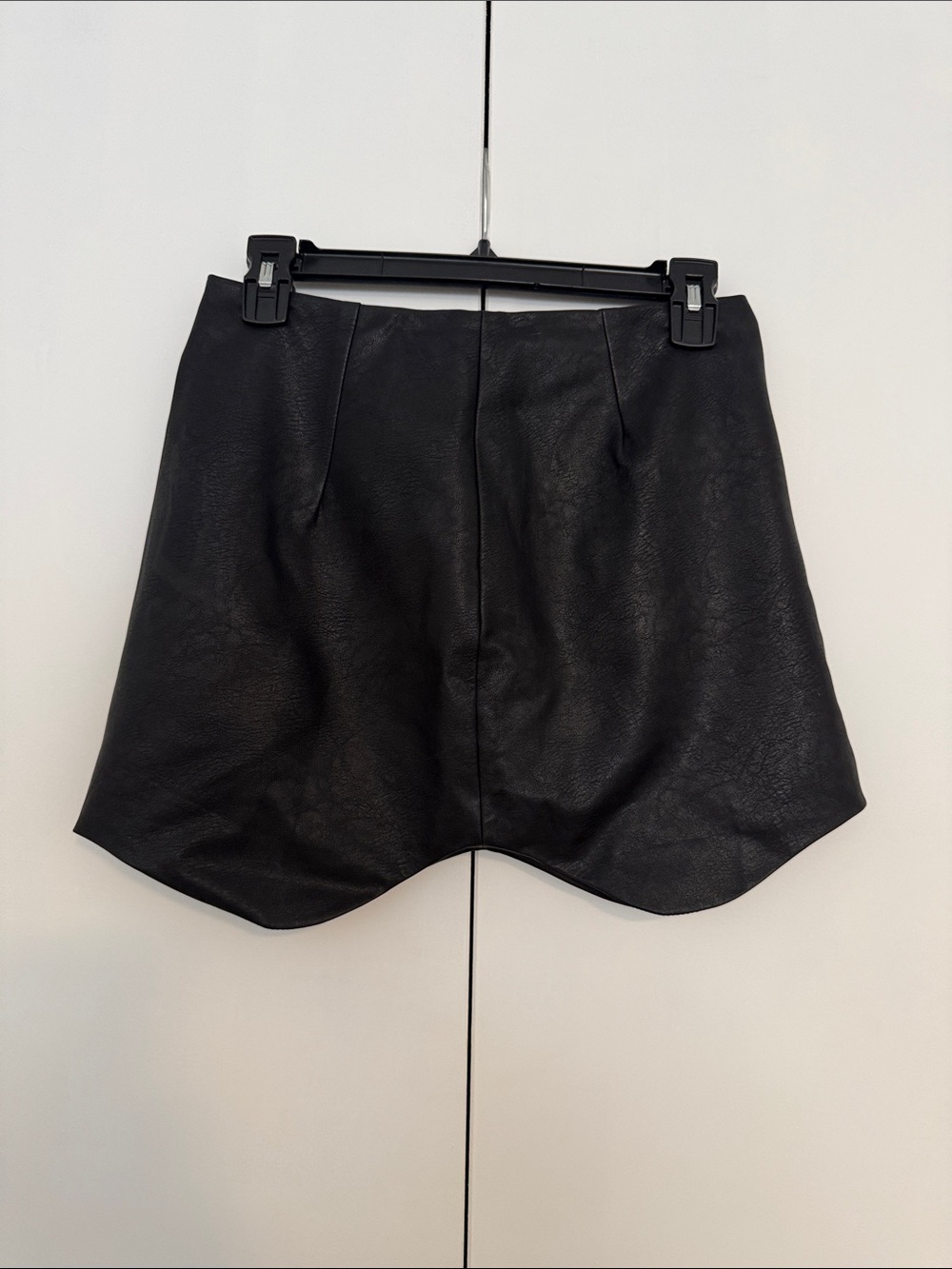 Olivaceous Black Faux Leather Curved Hem Mini Skirt